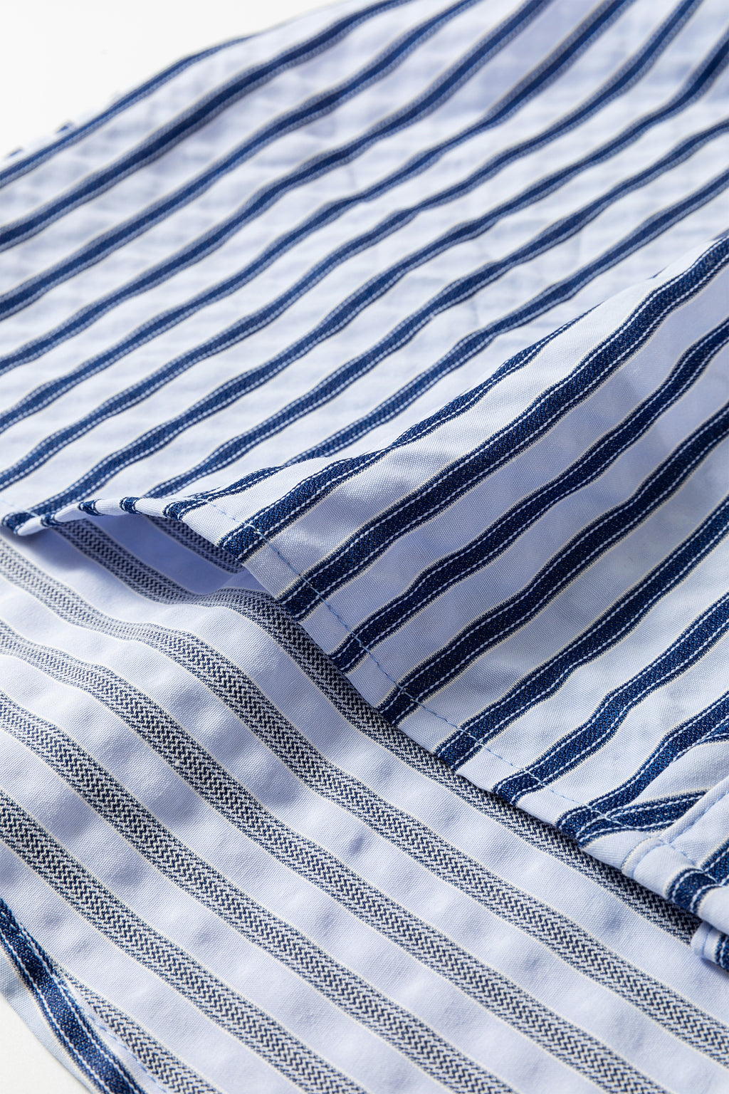 текстура на плат на синя риза на райе