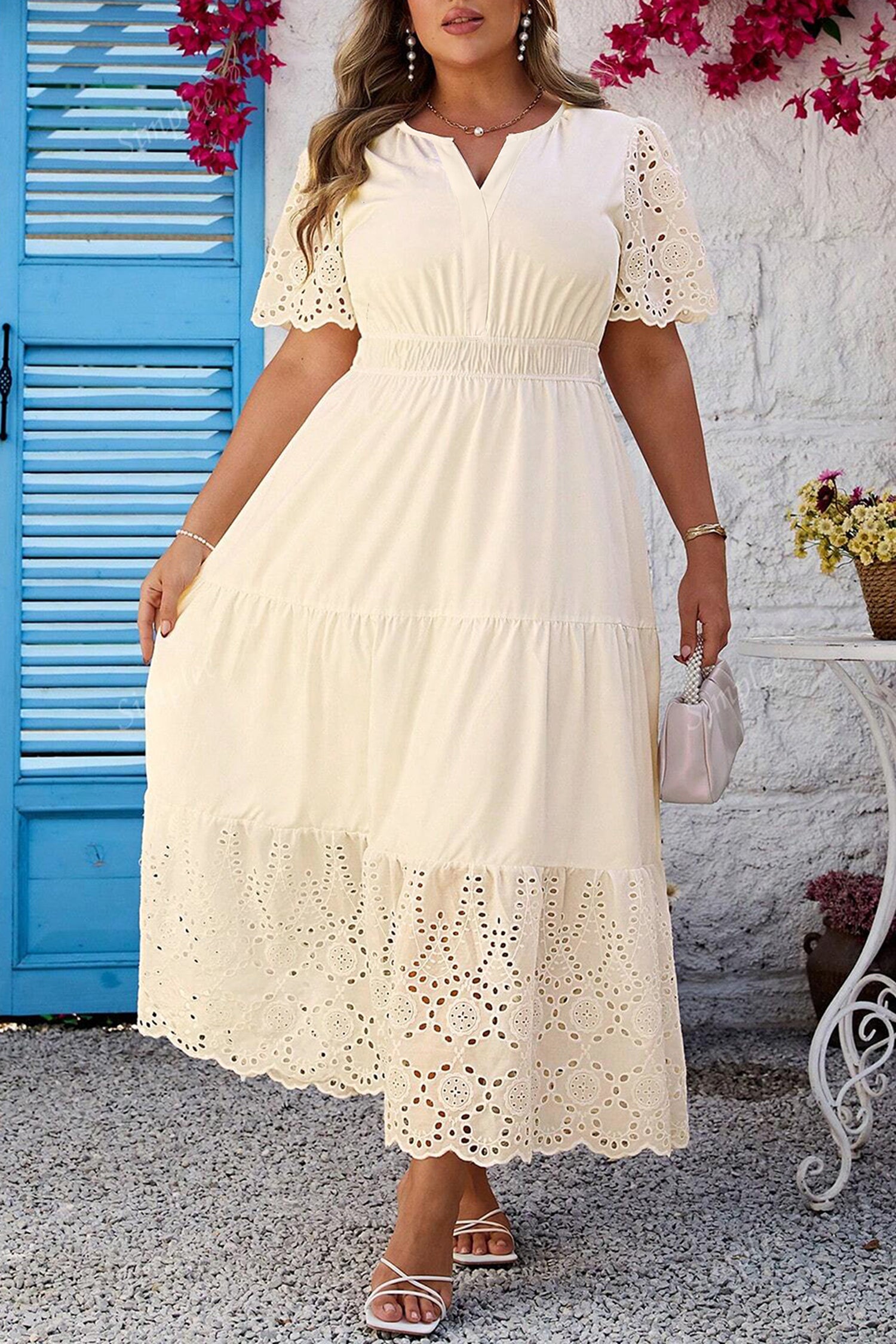 Long cream dress with openwork details and waist