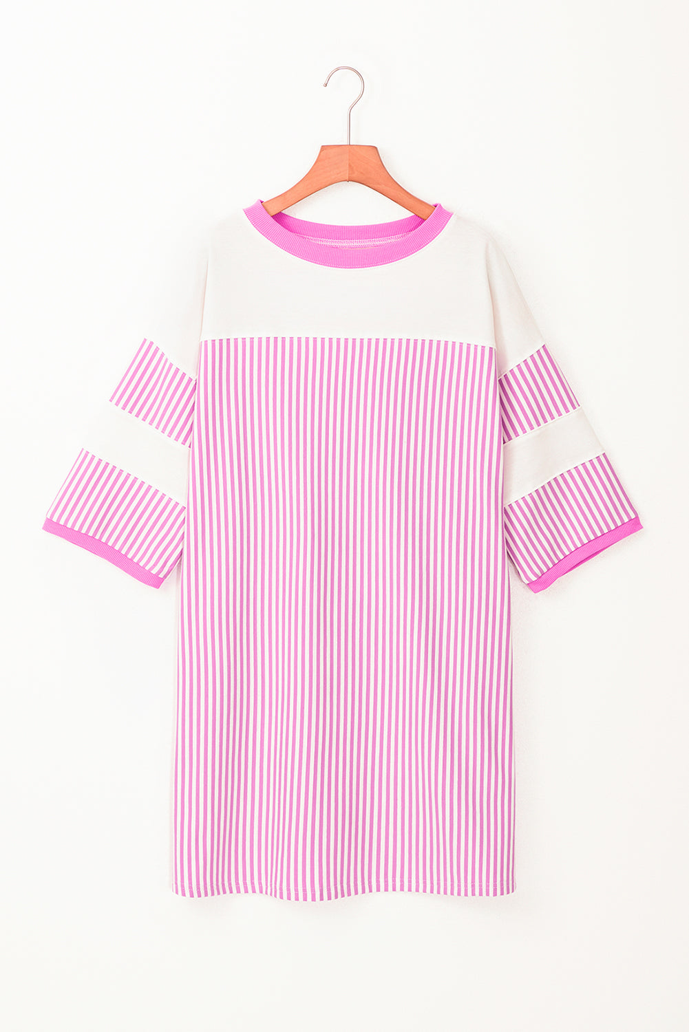 White and pink striped oversized t-shirt with short sleeves on a hanger