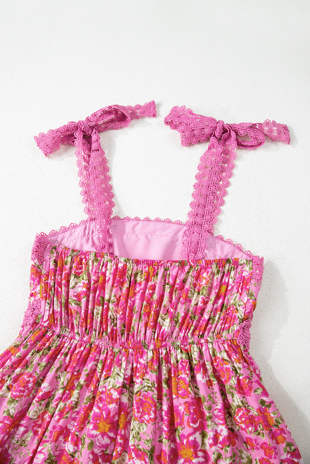 Pink floral dress with lace shoulder straps and ruched bodice, summer fashion