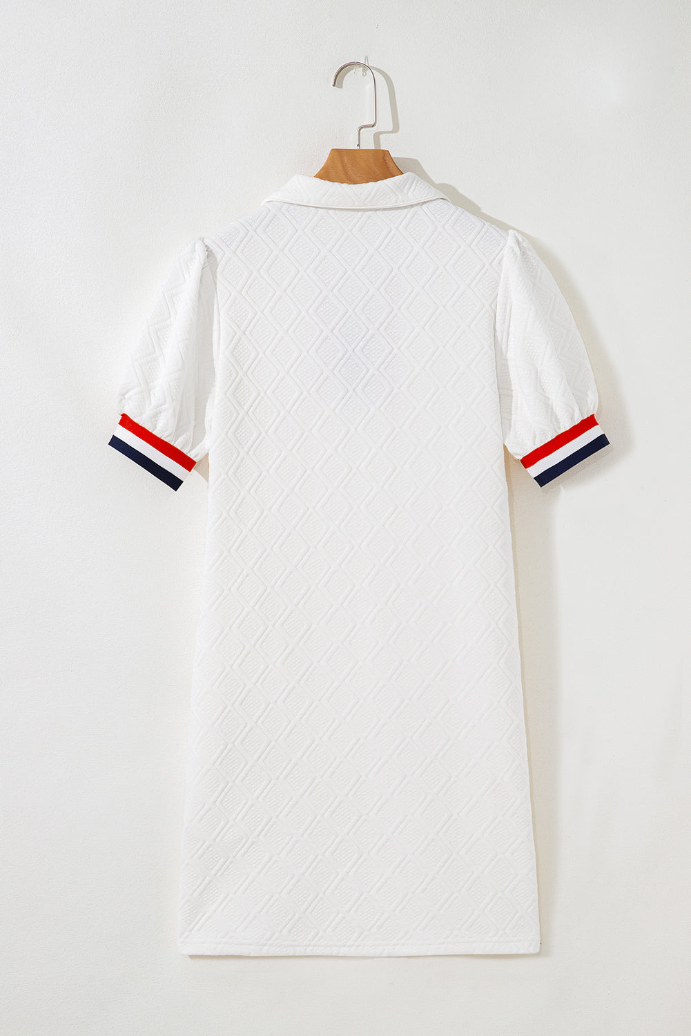 White textured short-sleeve dress with diamond pattern and striped sleeve cuffs