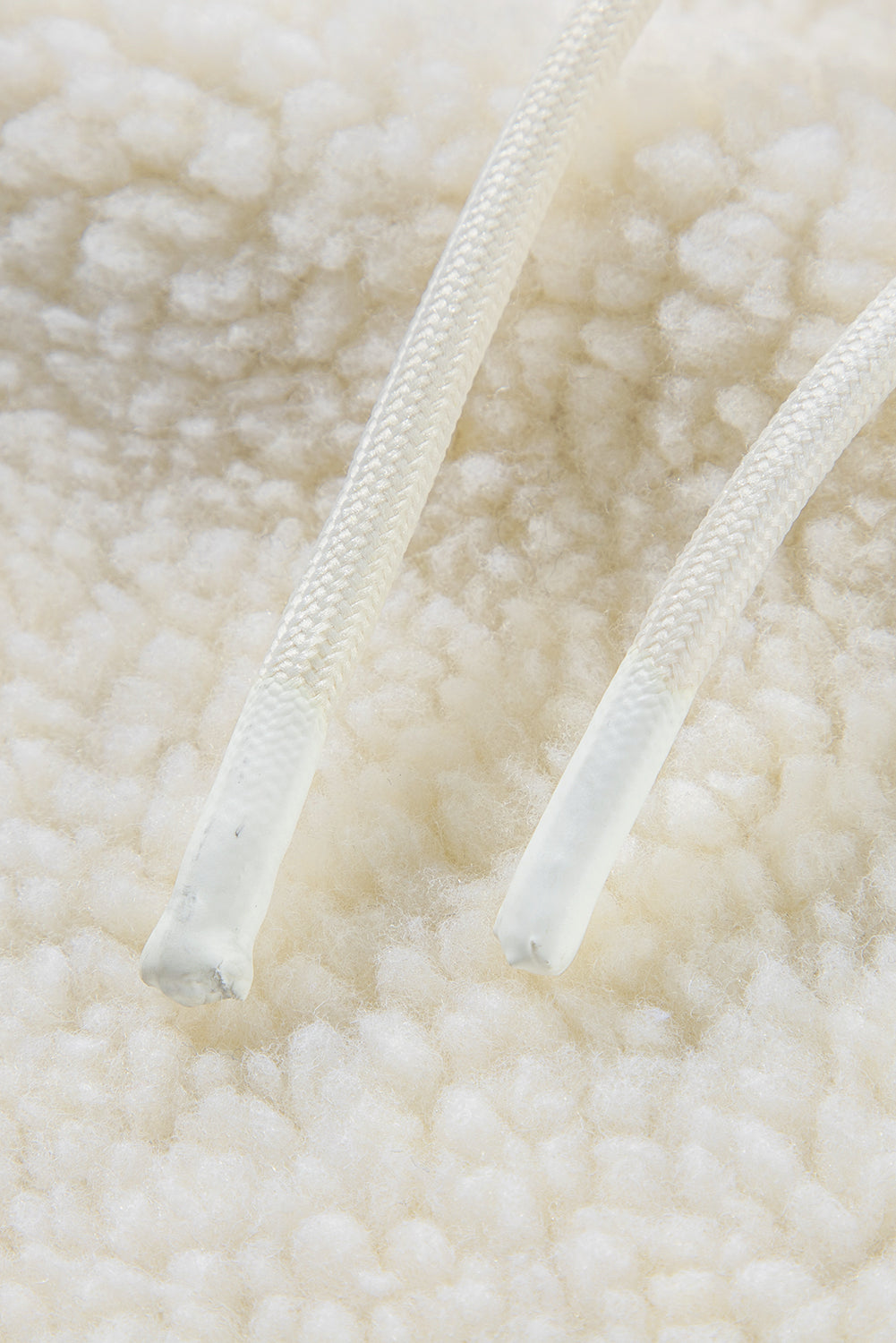 Fluffy light beige jacket with hood 