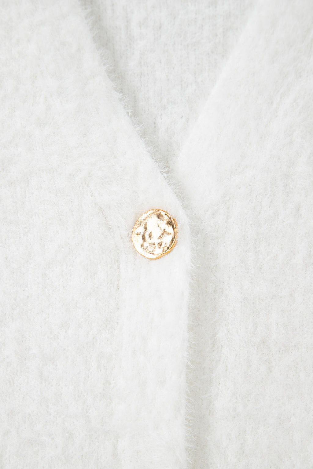 Дълга пухкава жилетка