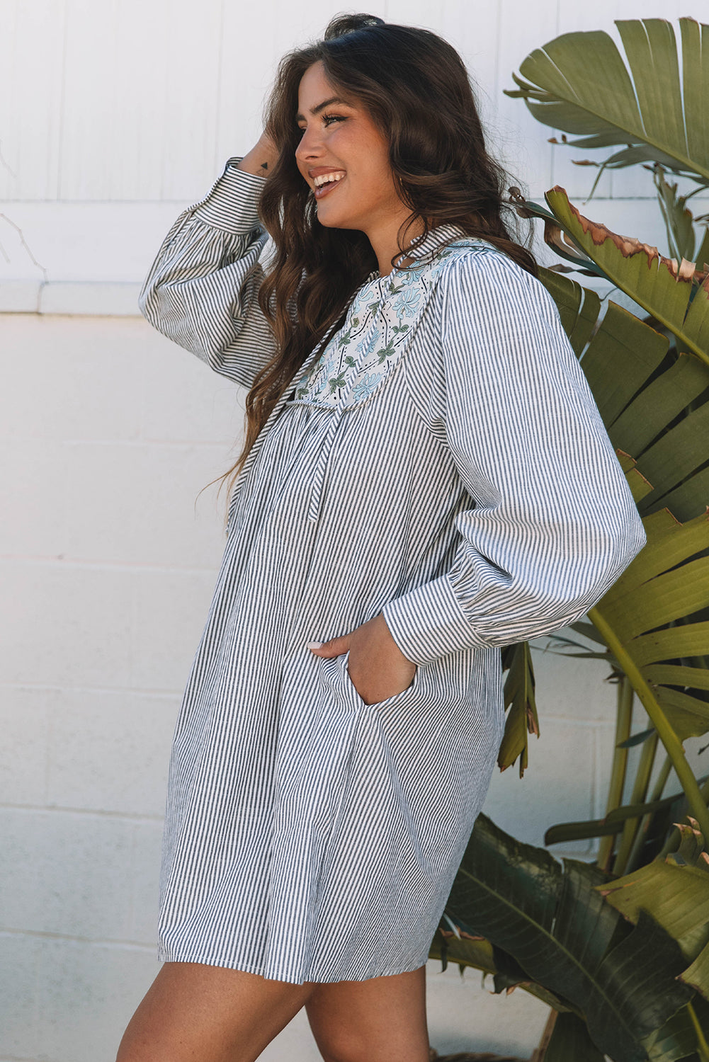 Striped dress with floral details 