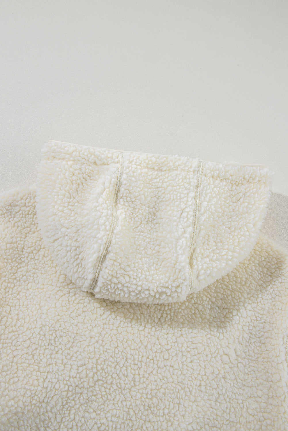 Fluffy light beige jacket with hood 