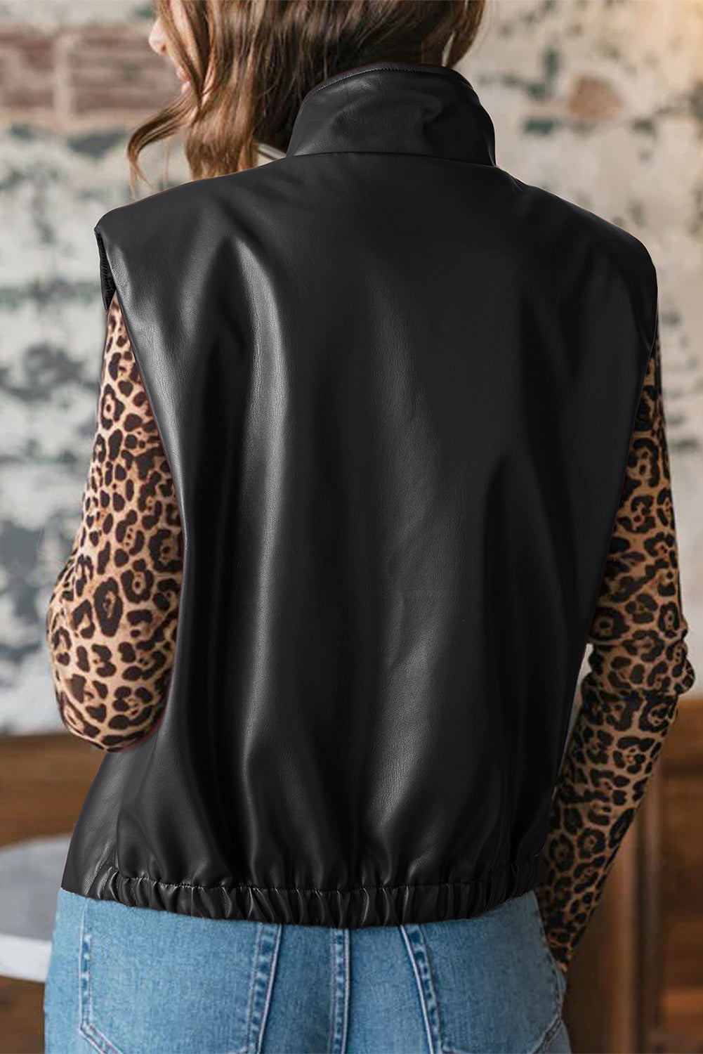 Дамски кожен елек изглед отзад