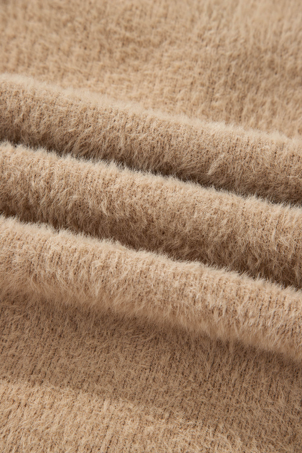 Дълга пухкава жилетка