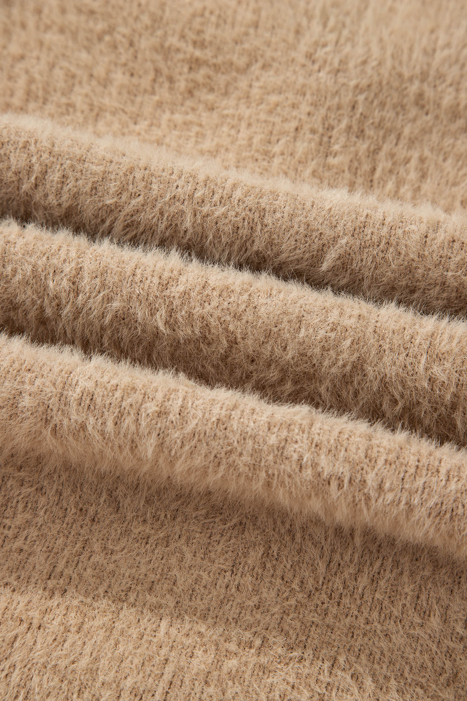 Дълга пухкава жилетка