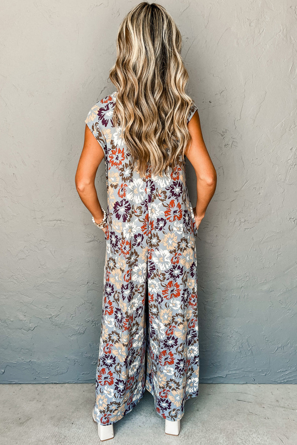 Long jumpsuit with floral print 