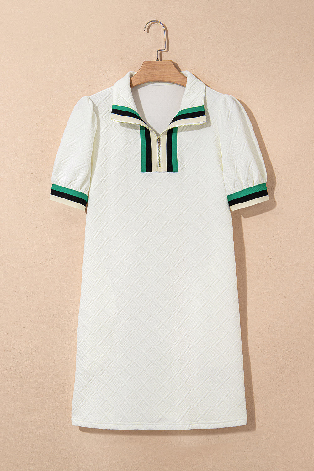 White short-sleeve textured dress with green and black striped collar and cuffs, zipper front