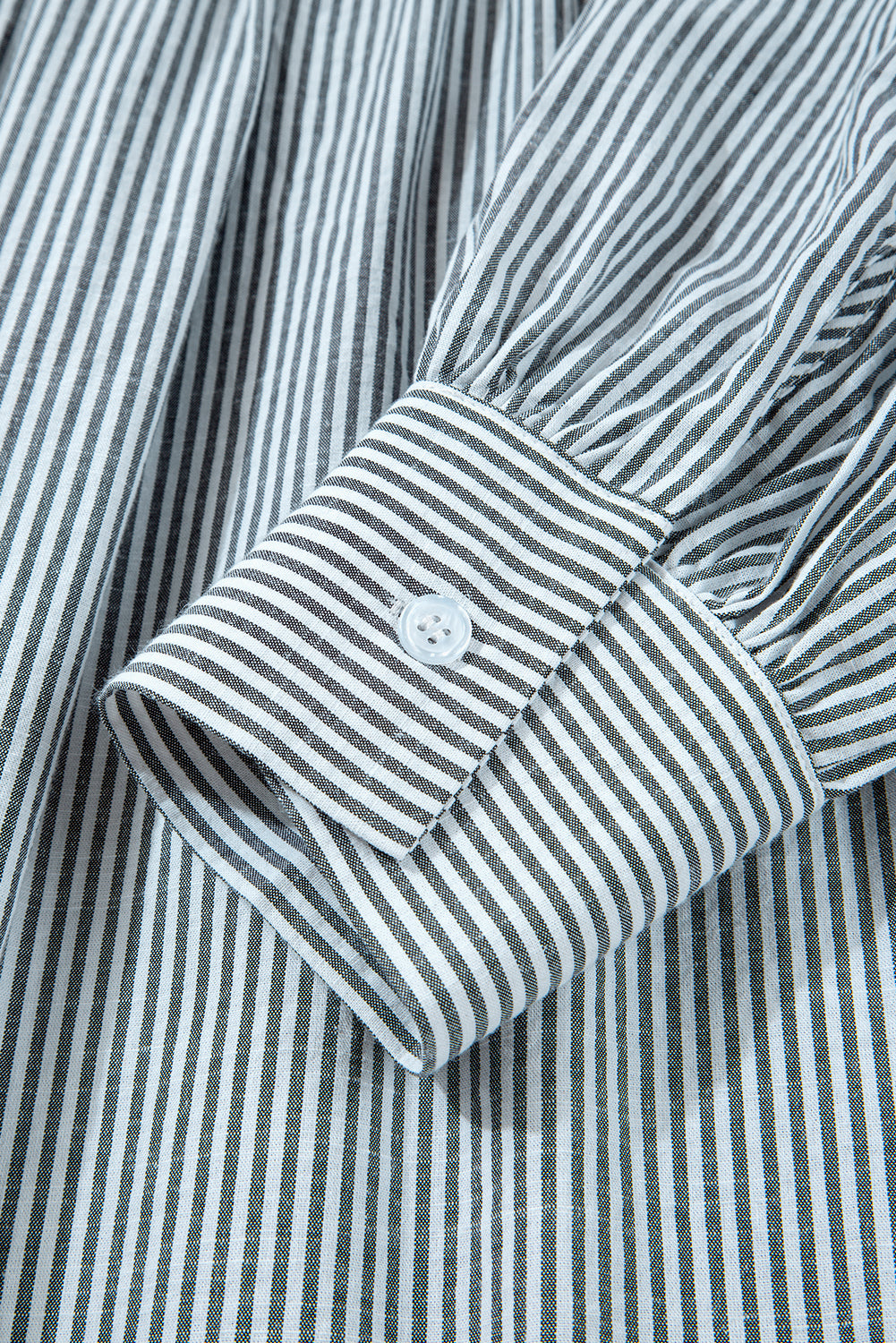 Striped dress with floral details 