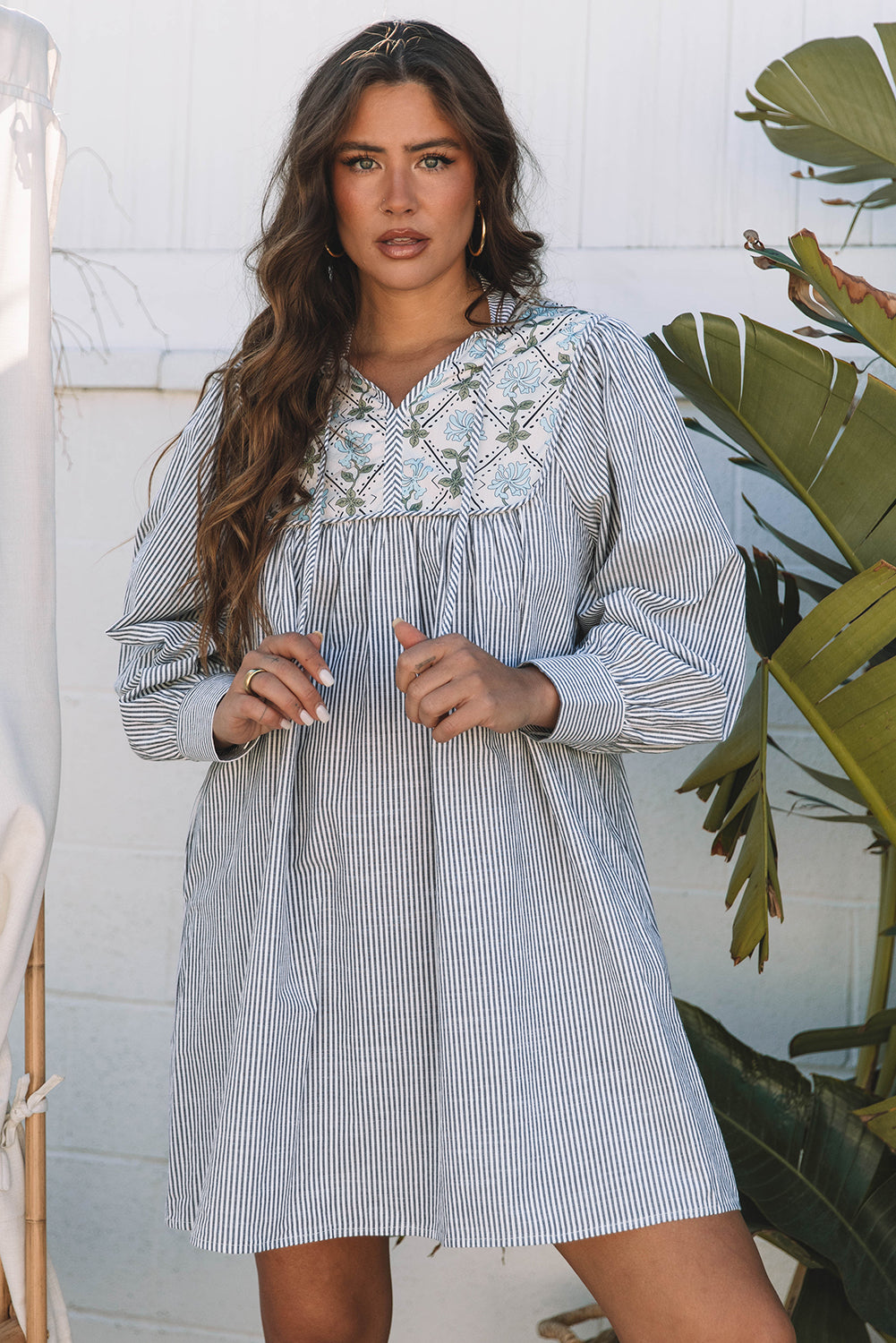 Striped dress with floral details 