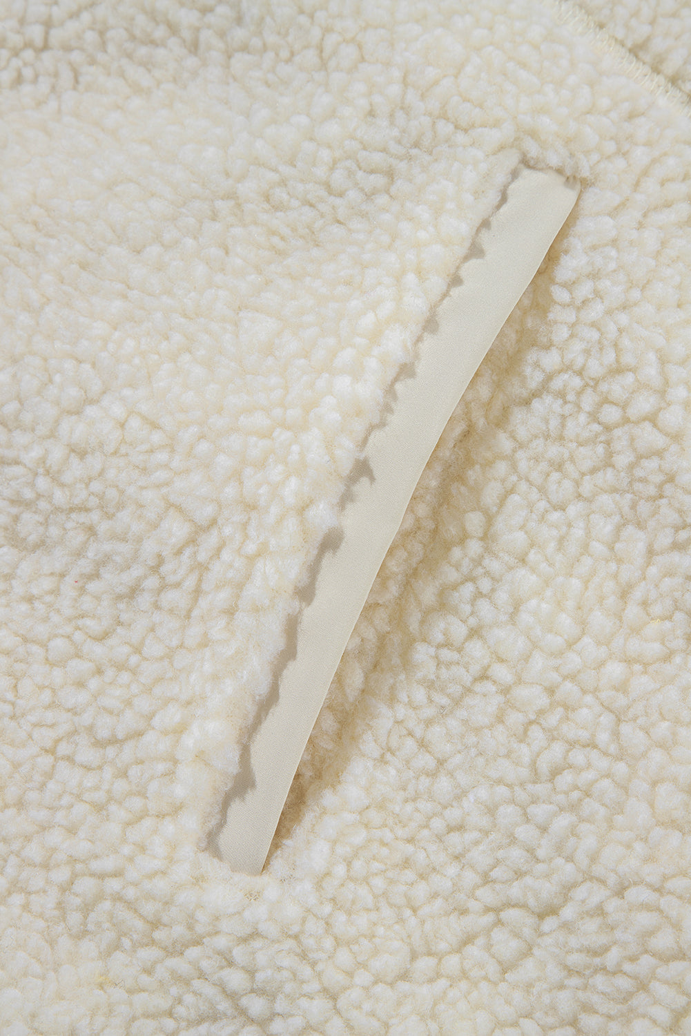 Fluffy light beige jacket with hood 