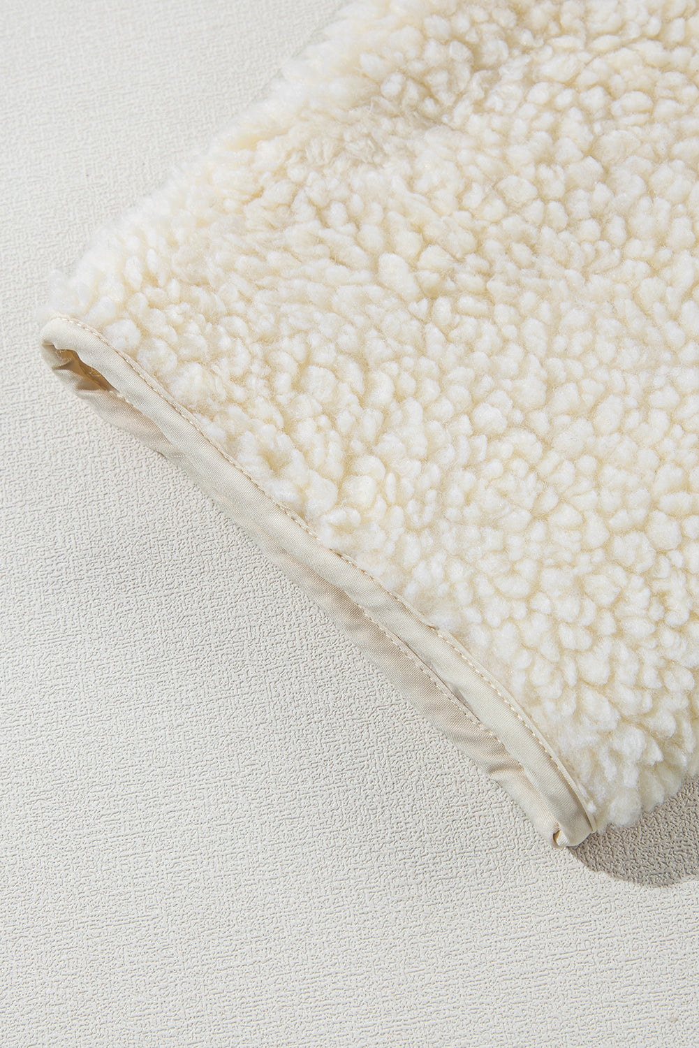 Fluffy light beige jacket with hood 