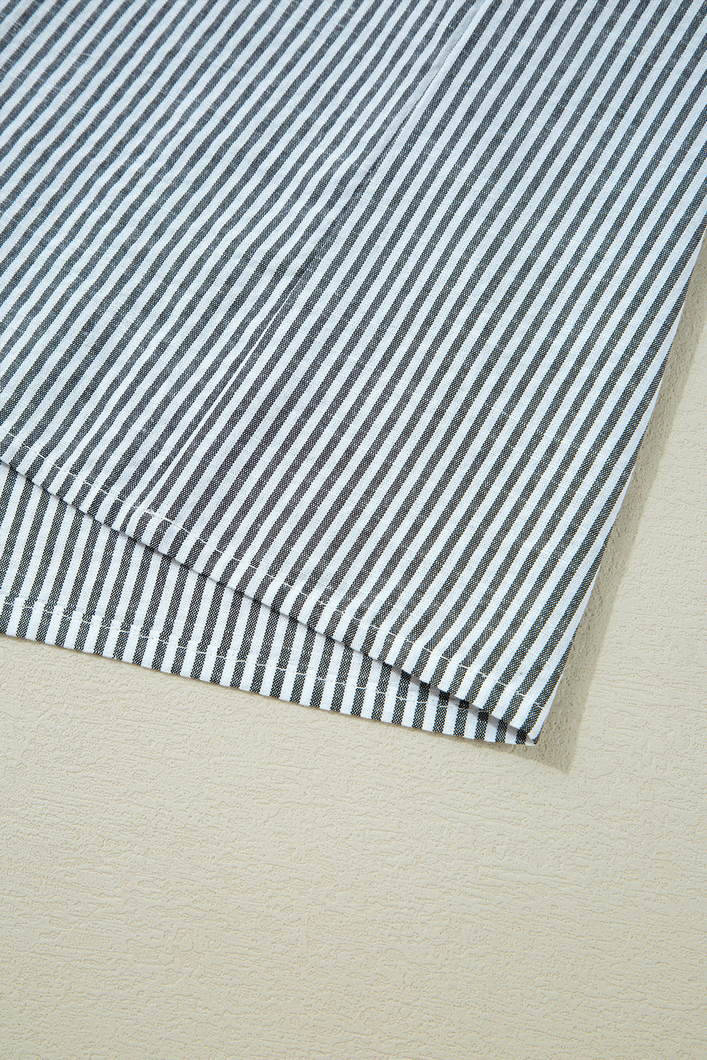 Striped dress with floral details 