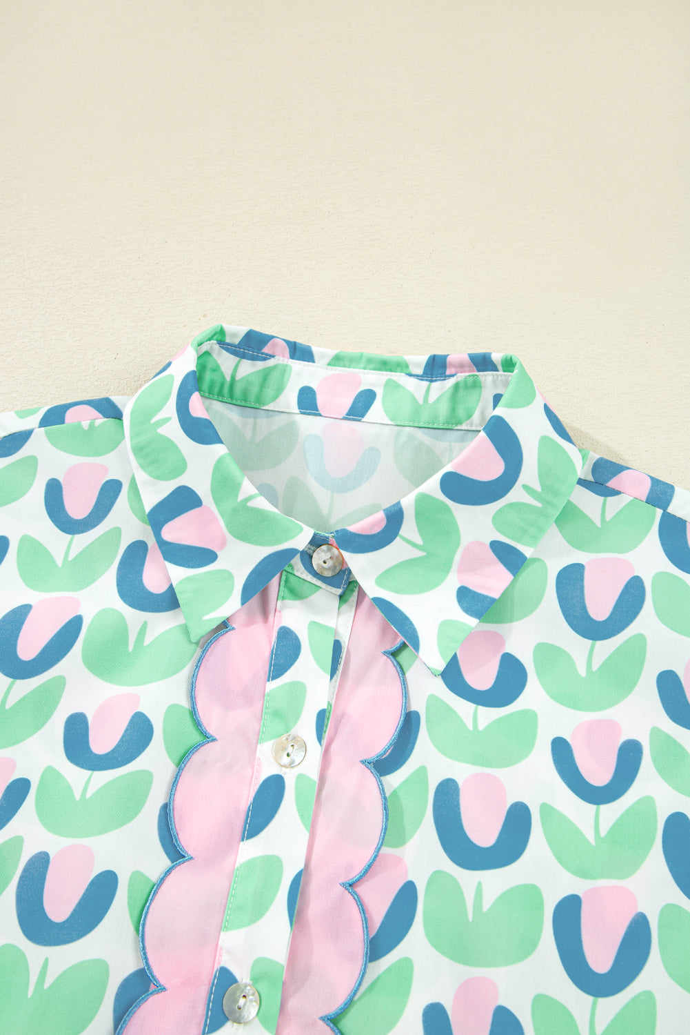 Pastel tulip print button-up shirt with scalloped edge detail and pointed collar