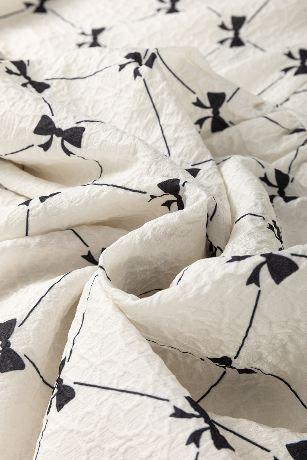 Рокля с принт на панделки