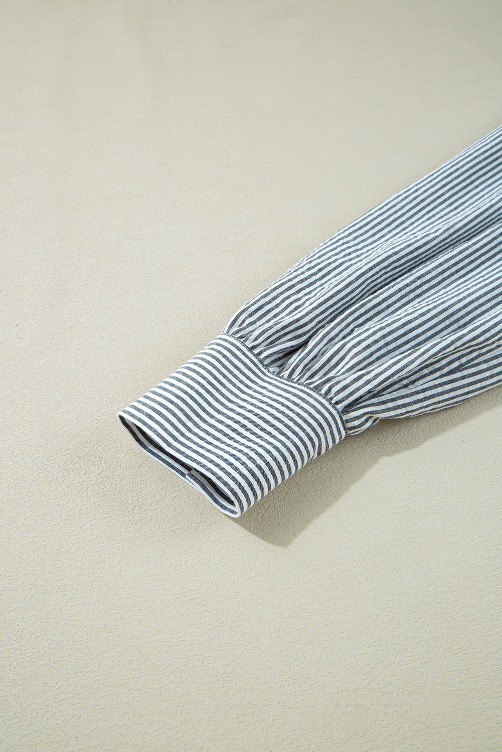 Striped dress with floral details 