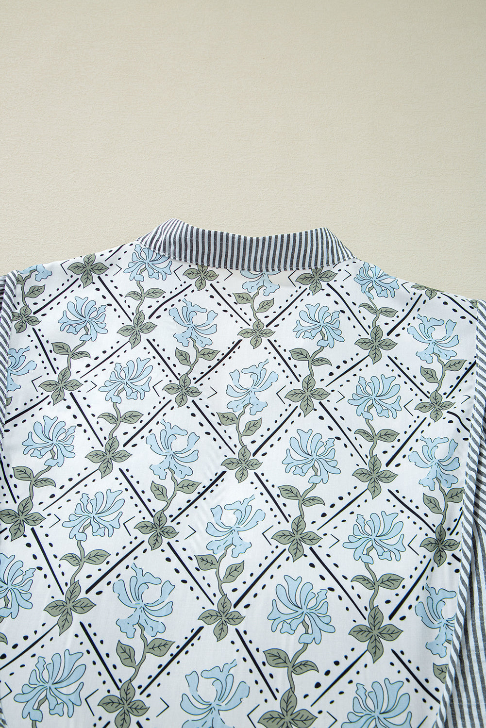 Striped dress with floral details 