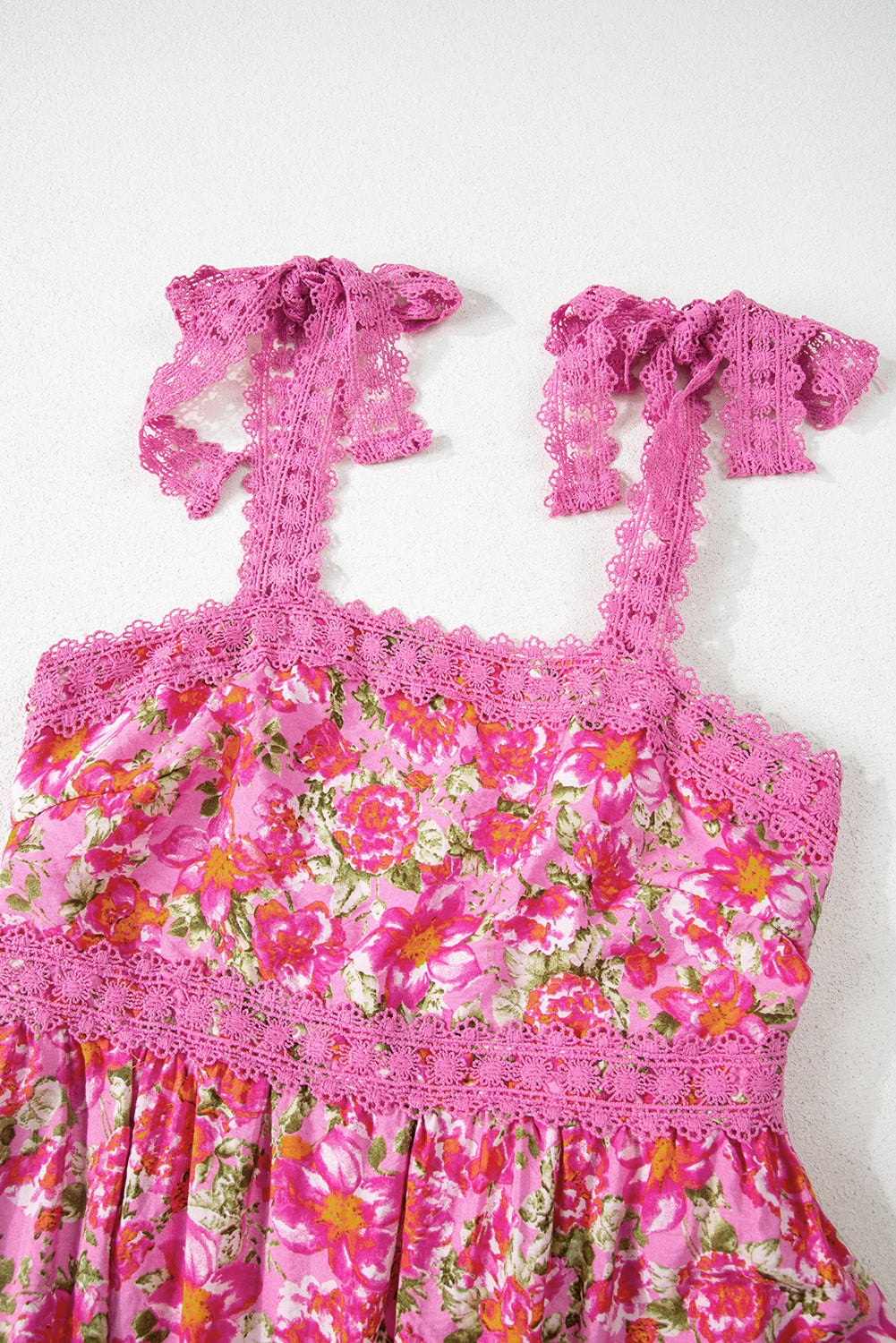 Pink floral dress with lace trim and bow tie shoulder straps, summer fashion