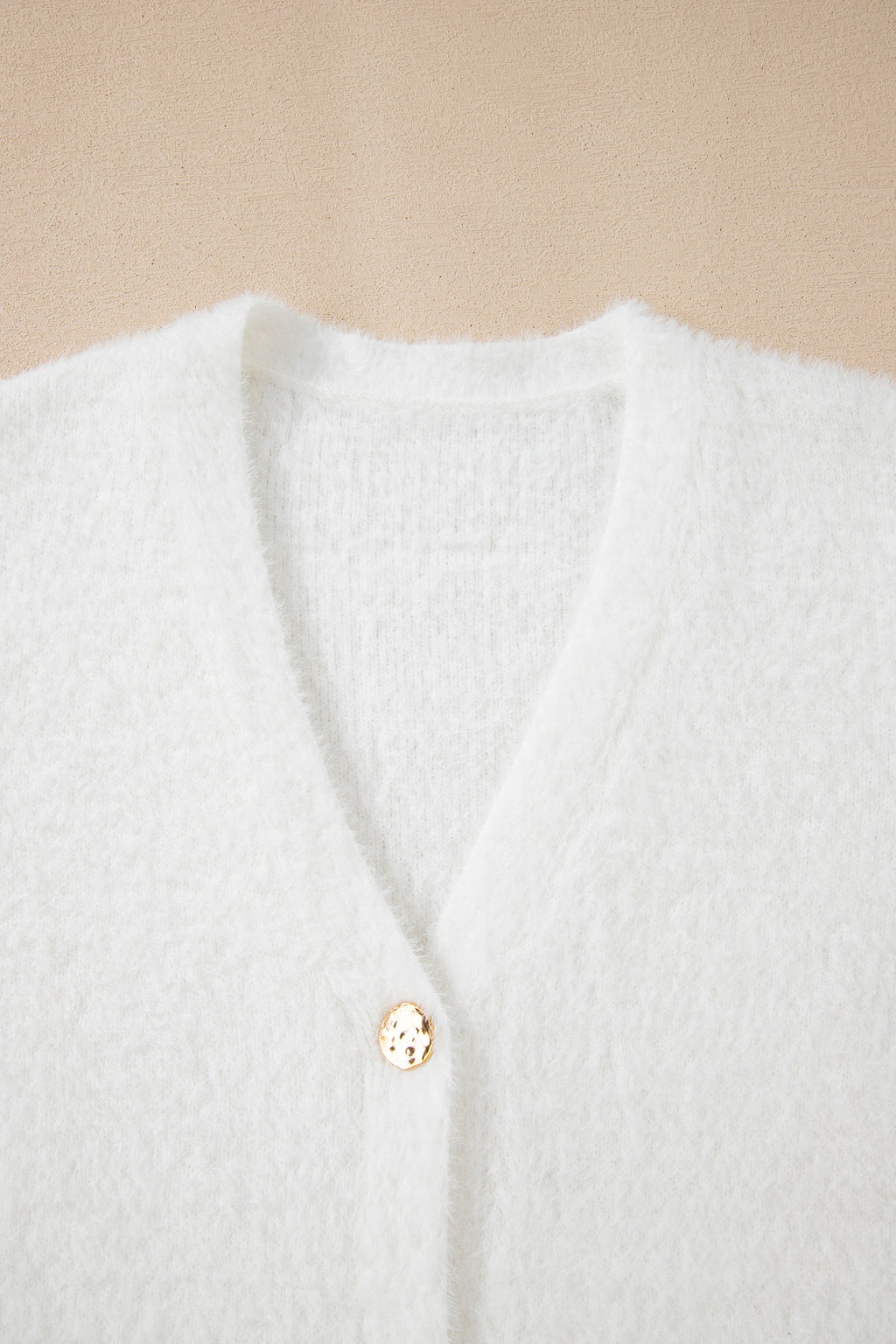 Дълга пухкава жилетка