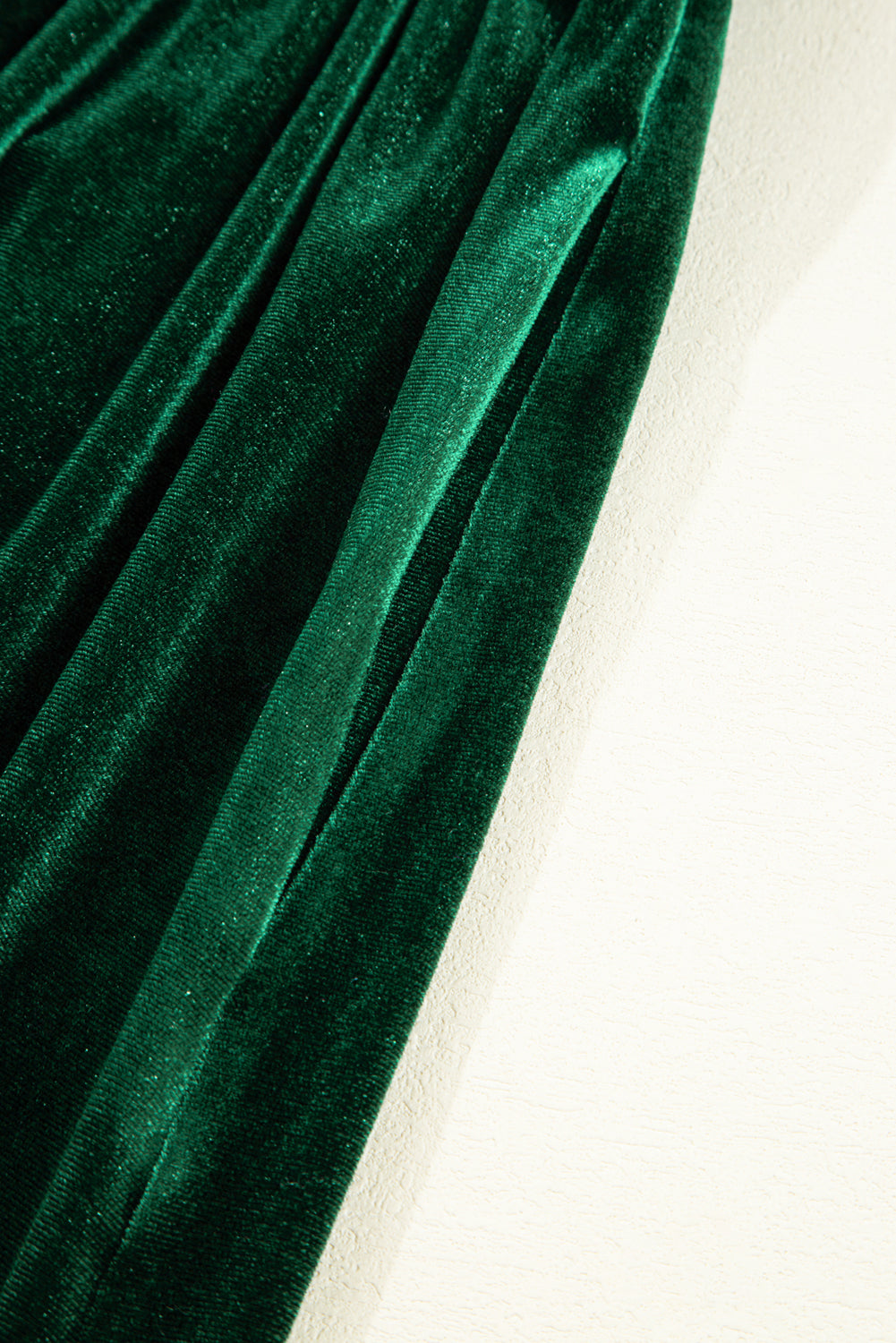 emerald green velvet fabric with soft texture and elegant folds