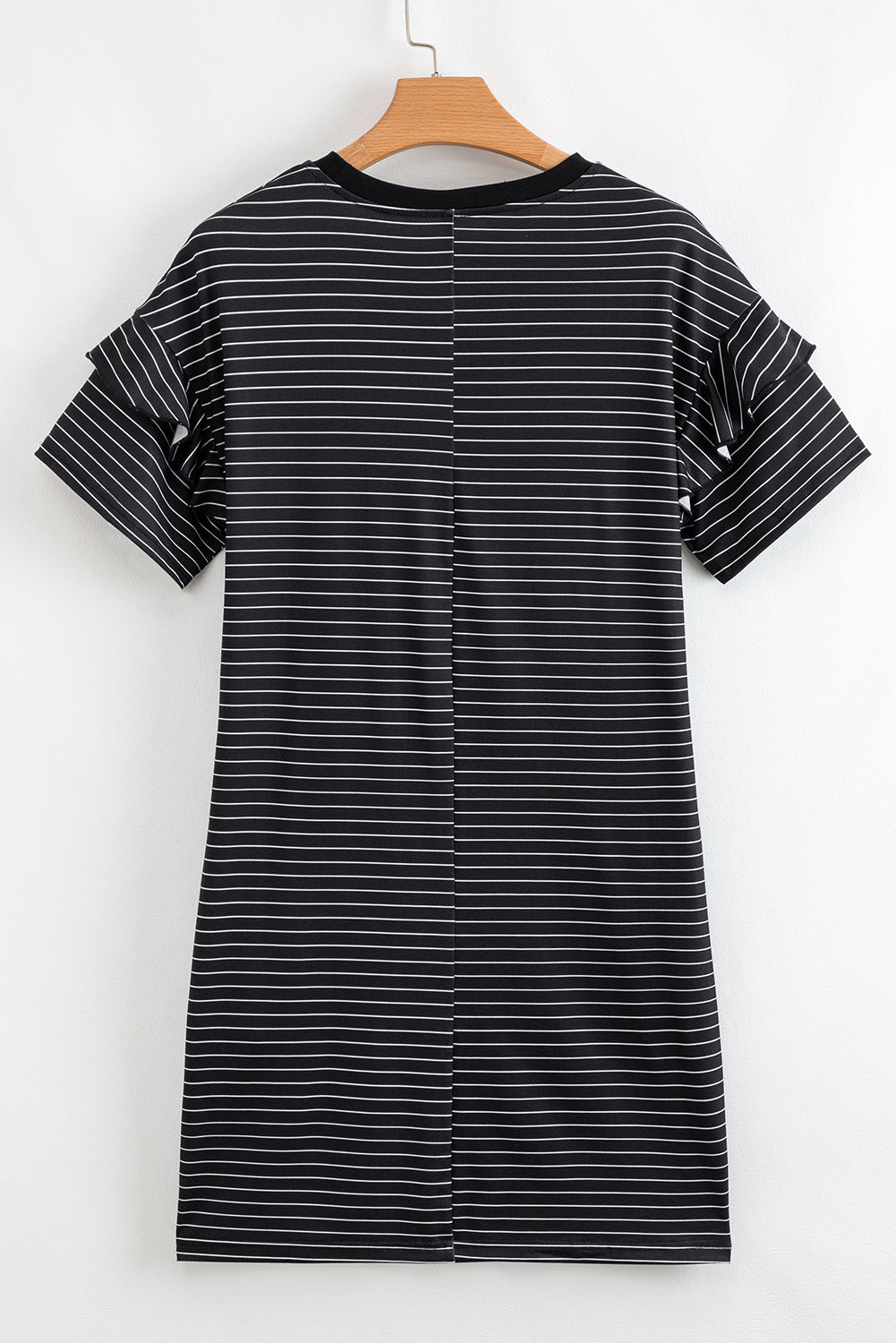 Black and white striped short sleeve t-shirt dress on wooden hanger