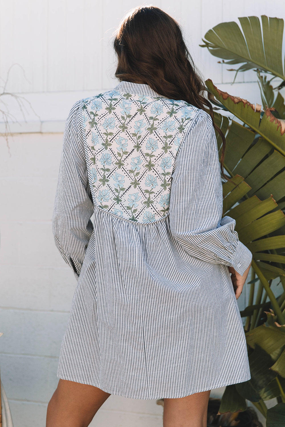 Striped dress with floral details 
